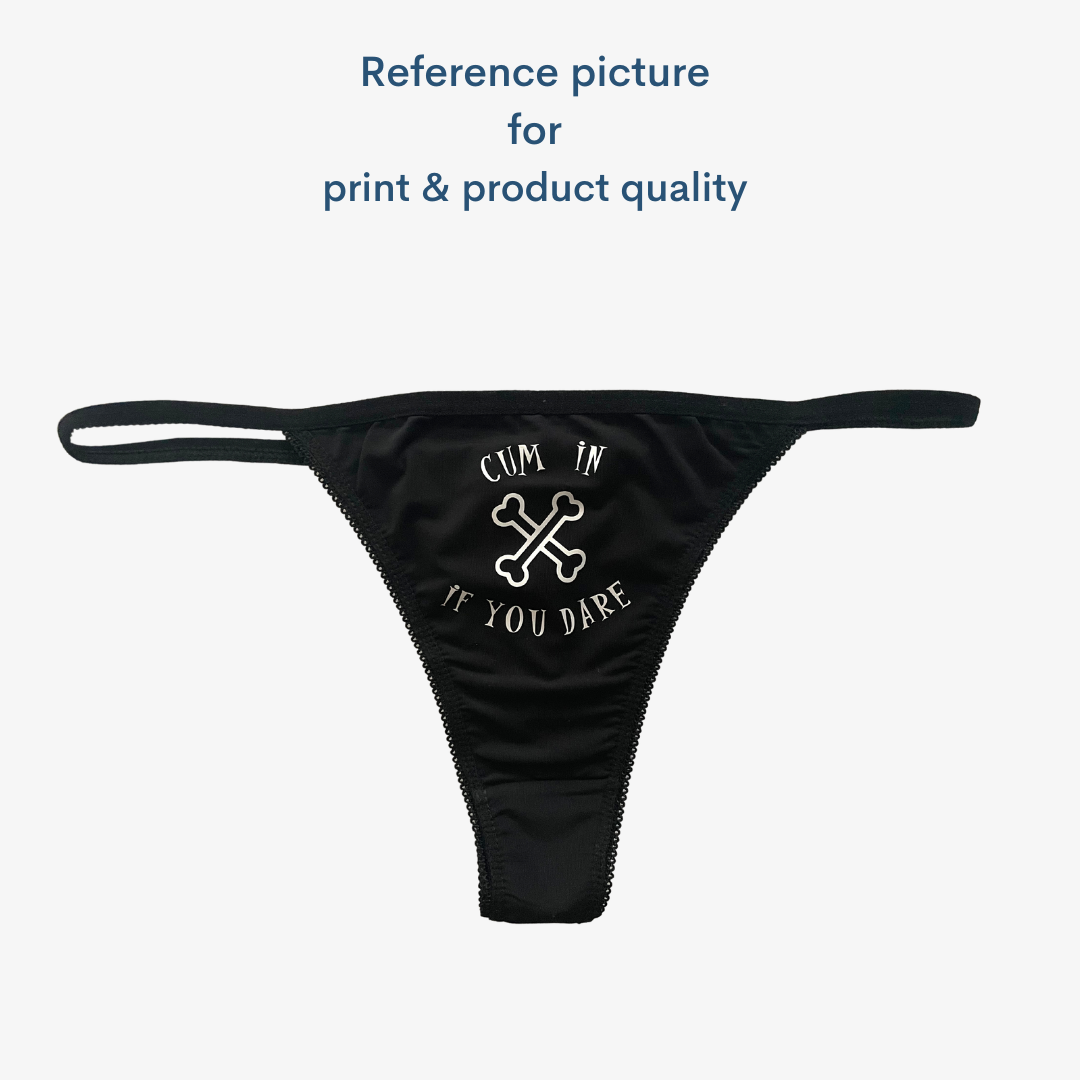 a black bikini with a skull and crossbones on it