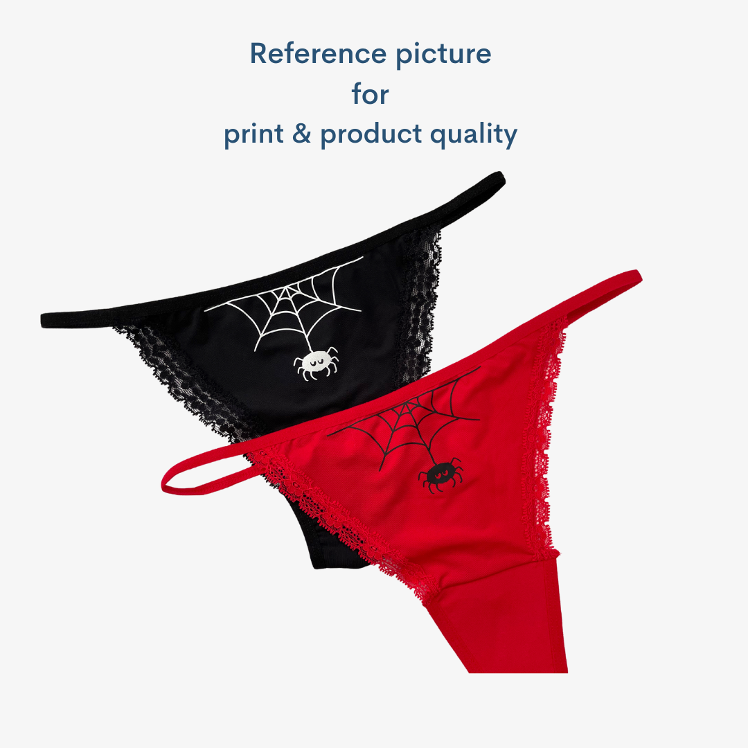 a pair of underwear with spider webs on them