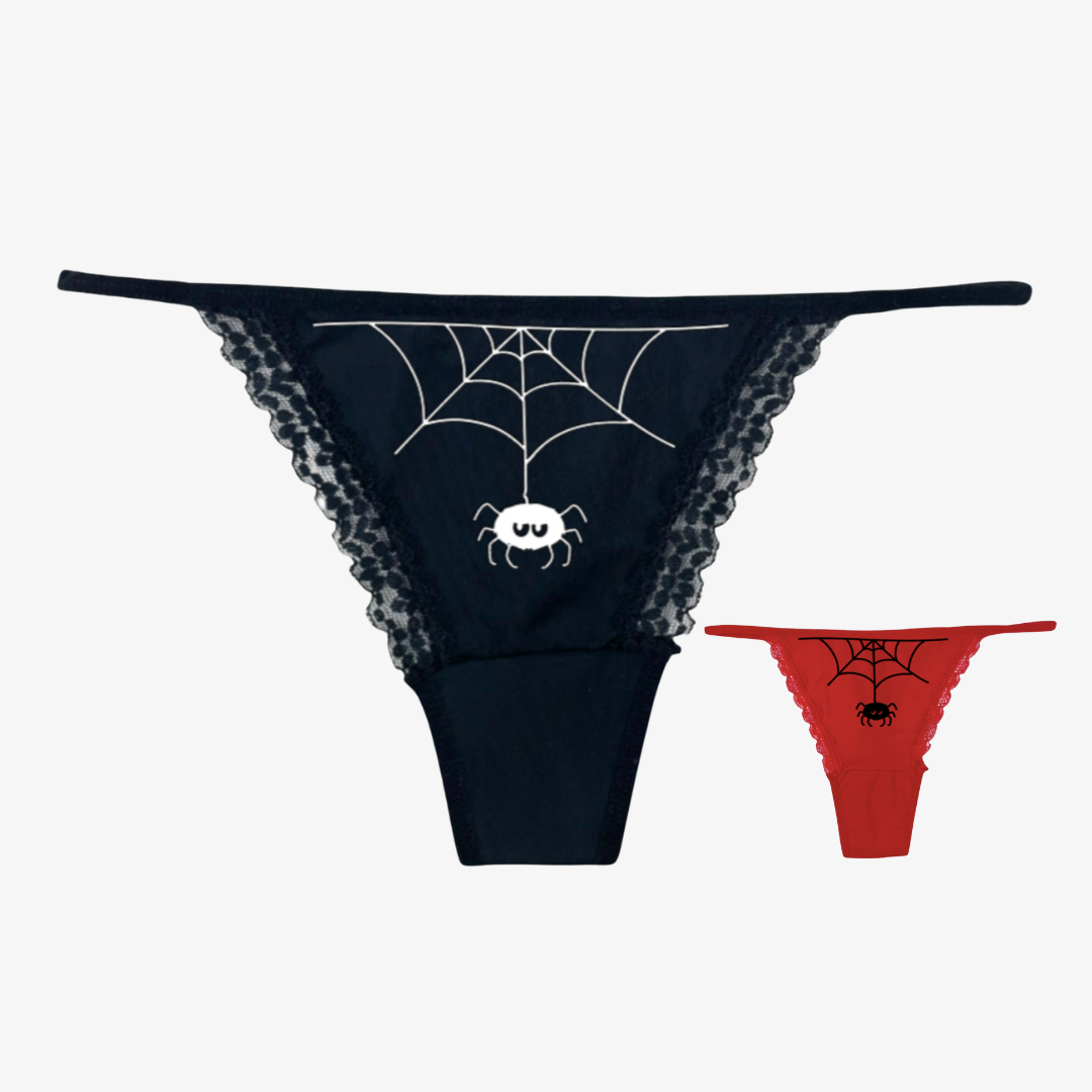 two underwear with spider webs on them